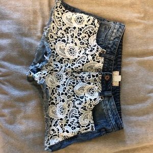 Denim shorts with lace front